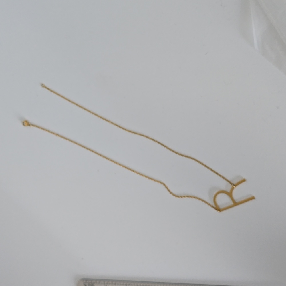 Goldtone R Initial necklace as featured on Schitt's Creek